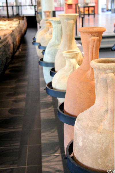 Collection of Roman-era amphorae to ship oils & wine in antiquity at Arles Antiquities Museum. Arles, France.