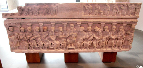 Carved Christ & Apostles on marble sarcophagus for Bishop Concordius (380-90) at Arles Antiquities Museum. Arles, France.