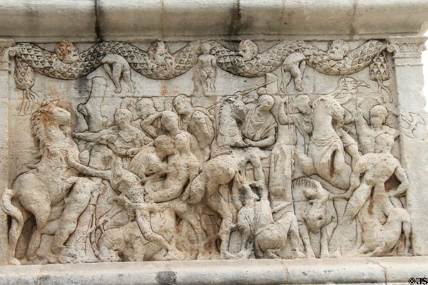 Wild boar hunting relief (30-20 BCE) on south base of Roman Mausoleum at Glanum Ruins. Saint-Rémy-de-Provence, France.