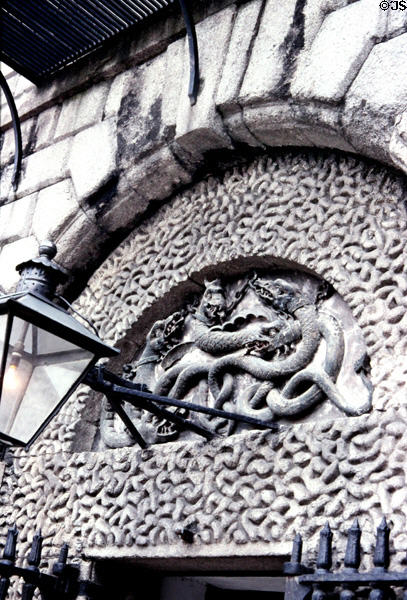 Chained dragon carving over entrance of Kilmainham Gaol (Jail) Museum. Dublin, Ireland.