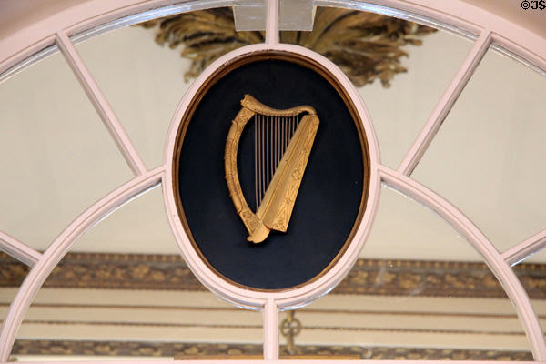 Irish harp over doors at top of grand staircase landing at Dublin Castle. Dublin, Ireland.