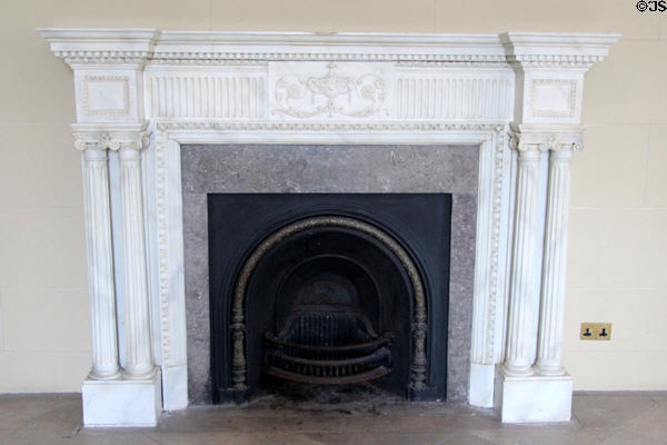 Painted timber fireplace in entrance hall at Rathfarnham Castle. Dublin, Ireland.
