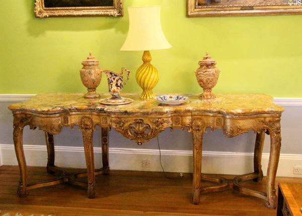 Drawing room side table with stone urns & ceramic objects at Emo Court. Ireland.