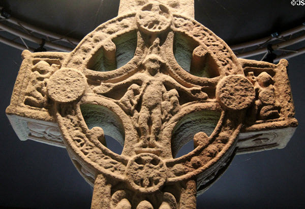 Crucifixion carving on cross of Scriptures (east face) at Clonmacnoise museum. Ireland.