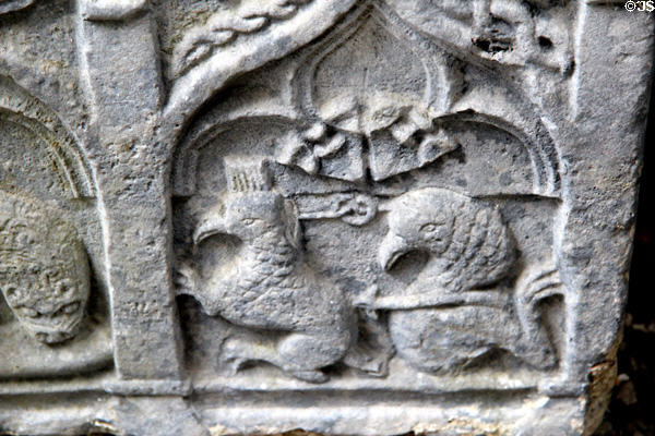 Detail of mythical animals on stone tomb (16thC) in cathedral at Rock of Cashel. Cashel, Ireland.