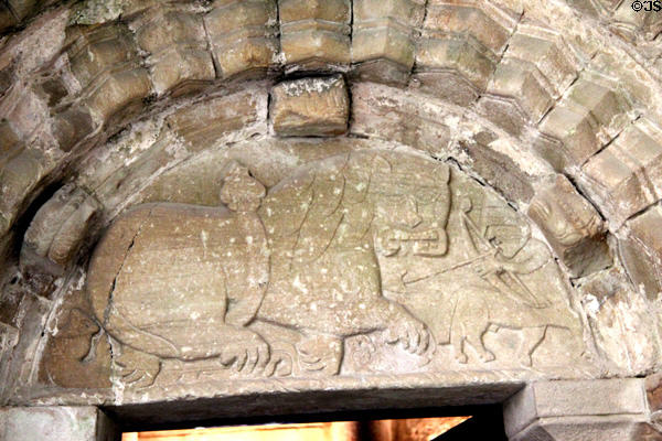 Centaur archer hunting a lion carved over arch in Cormac's Chapel at Rock of Cashel. Cashel, Ireland.