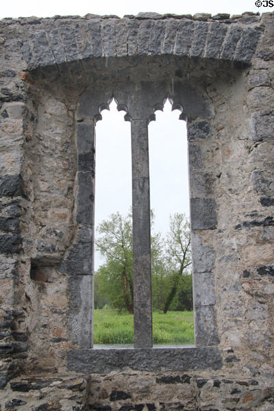 Window frame looking out to grounds of Desmond Castle. Adare, Ireland.