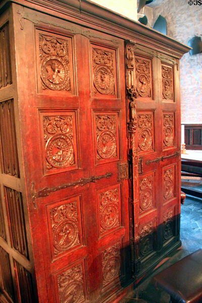 Ornately carved armoire in Main Guard at Bunratty Castle. County Clare, Ireland.