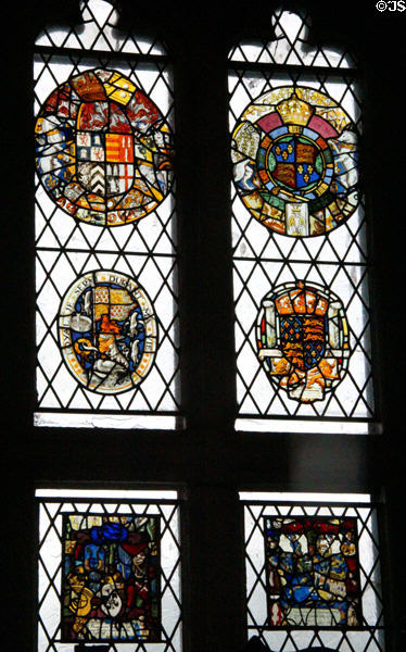 Stained glass armorial windows in Great Hall at Bunratty Castle. County Clare, Ireland.