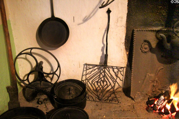 Iron utensils in Golden Vale Farmhouse at Bunratty Castle & Folk Park. County Clare, Ireland.