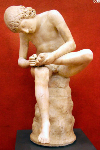 Roman-era sculpture of Boy with Thorn (Spinario) (1stC BCE) at Uffizi Gallery. Florence, Italy.