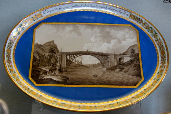 Vienna porcelain platter (c1800) painted with first iron bridge near Coalbrook-Dale, England at Pitti Palace Ceramics Museum. Florence, Italy.