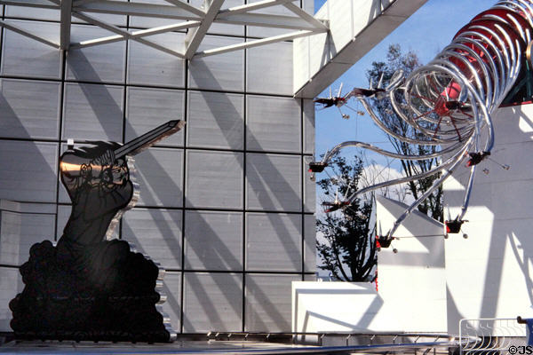 Sculpture of samurai warrior fighting symbolic dragon at Expo 85. Tsukuba, Japan.