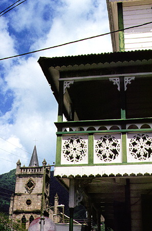 Gingerbread house and church at Bridge and Sir Arthur Lewis Streets in Soufrière. St Lucia.