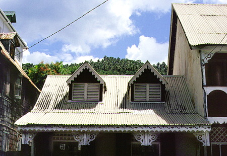 Tin-roofed colonial buildings on the town square in Soufrière. St Lucia.