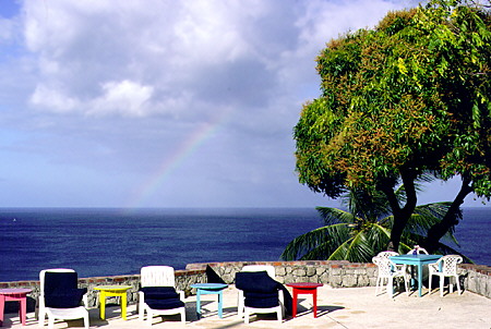 Rainbow over the sea seen from the Stonefield Estate near Soufrière. St Lucia.