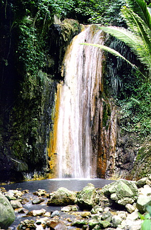 Multicolored minerals of the waterfall at the Diamond Gardens near Soufrière. St Lucia.
