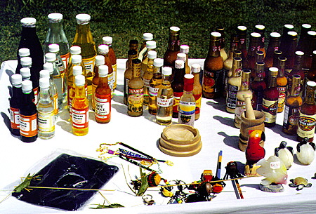 Various sauces, oils and banana ketchup for sale at a stand at Marigot Bay. St Lucia.