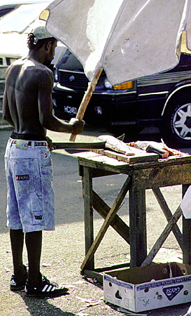 Fish vendor at Castries Market. St Lucia.