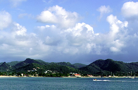 Clouds and hills surround Rodney Bay. St Lucia.