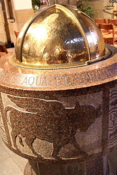Bull carving, representing St Luke Evangelist, on baptismal font at Cathedral of Our Lady. Luxembourg, Luxembourg.