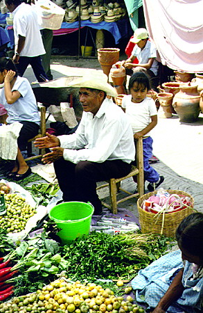 Selling fresh produce at market in Acatlán. Mexico.
