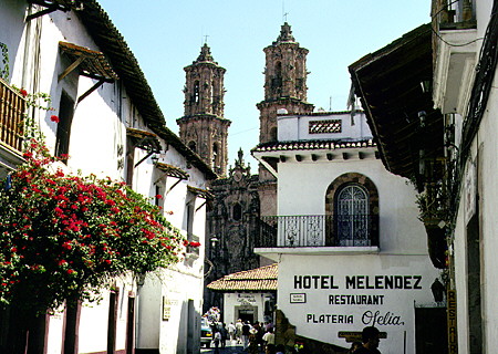 View of street looking towards church in Taxco. Mexico.