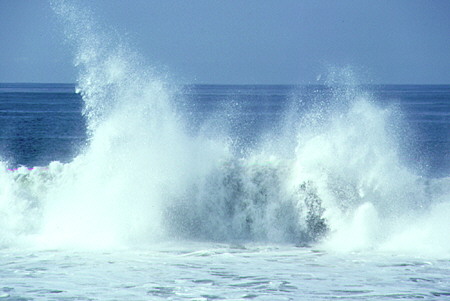 Waves explode as they hit beach at Manialtepec. Mexico.