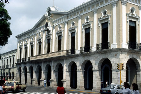Mérida town hall (16thC) with colonnades & a clock tower. Mexico.