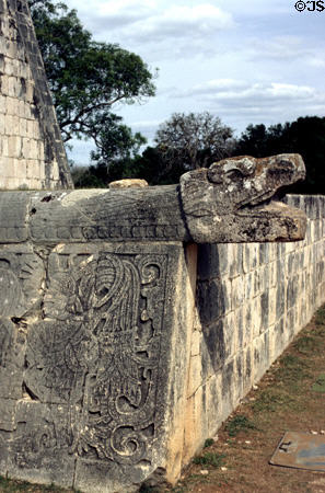 Serpent stone carving on wall of playing field of Great Ball Court at Chichén Itzá. Mexico.