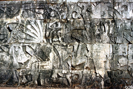 Mayan glyph of priest with sword decapitating losers of ball games at Chichén Itzá. Mexico.