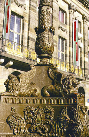 Winged lions on the light stand at Royal Palace. Amsterdam, Netherlands.