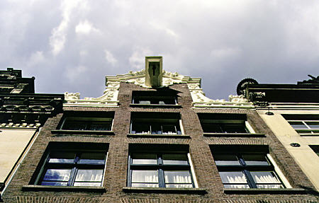 Beam & hook used to hoist furniture to upper stories on gable of house on Herengracht. Amsterdam, Netherlands.