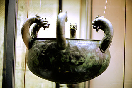 Etruscan bronze bowl with six animal heads in Vatican Museum. Vatican City.