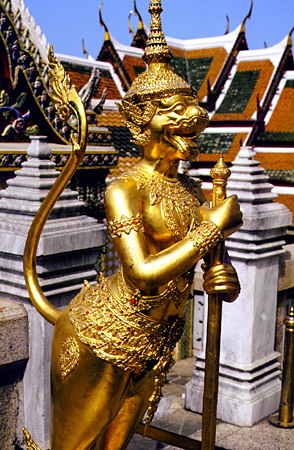 Golden statue of a temple guardian at the Grand Palace, Bangkok. Thailand.