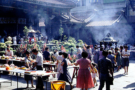 Smoke from burning incense fills Lungshan Temple, Taipei. Taiwan.