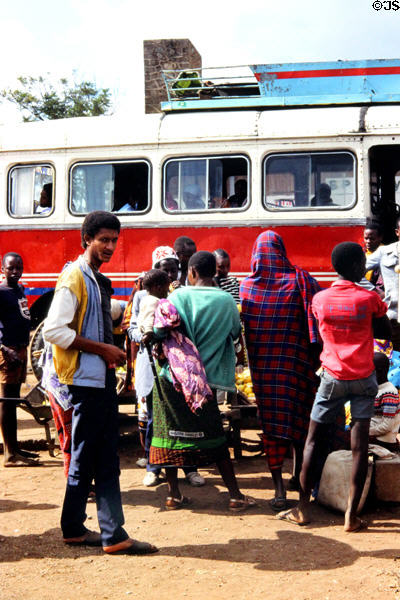 Boarding a bus at a stop in Mekuyuni. Tanzania.