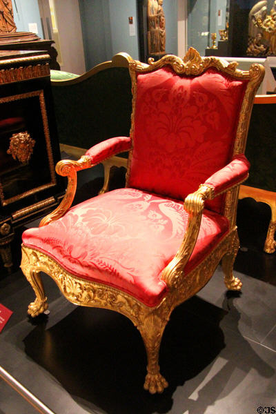Neoclassical armchair (1765) by Robert Adam of Scotland & made by workmen of Thomas Chippendale of London at National Museum of Scotland. Edinburgh, Scotland.