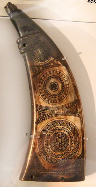 Scottish decorated powder horn with circular designs (1669) at National Museum of Scotland. Edinburgh, Scotland.