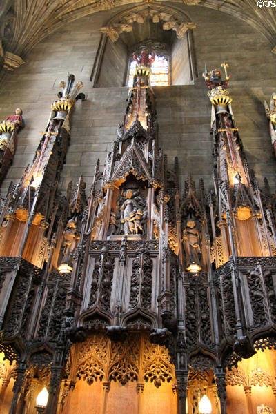 Gothic canopies with carving of St Margaret of Scotland teaching children at Thistle Chapel at St Giles Cathedral. Edinburgh, Scotland.