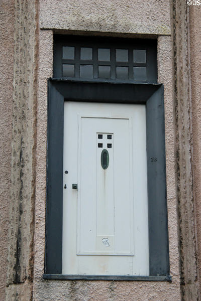 Charles Rennie Mackintosh-designed front door moved from demolished Mackintosh house nearby to Hunterian Art Gallery to display the original Mackintosh-designed furniture & woodwork interiors. Glasgow, Scotland.