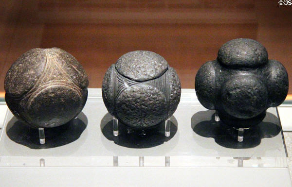 Carved stone balls of unknown purpose (3300-2000 BCE) from Aberdeenshire, Scotland at Kelvingrove Art Gallery. Glasgow, Scotland.