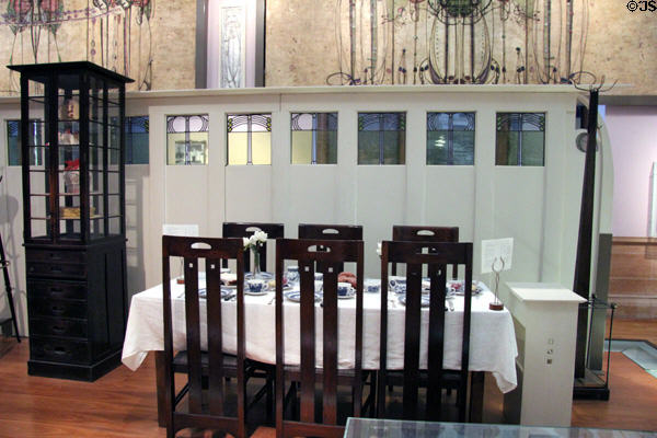 Ladies' Luncheon Room chairs, partition & cake display case (1900) by Charles Rennie Mackintosh for Miss Cranston's tearoom at Kelvingrove Art Gallery. Glasgow, Scotland.