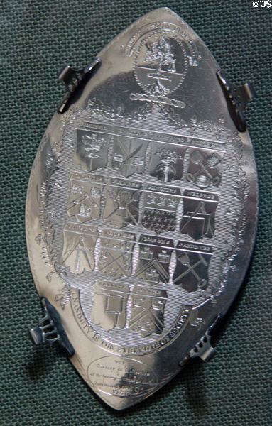 Sterling silver plaque engraved with trades symbols of Glasgow (1788) at Pollok House. Glasgow, Scotland.