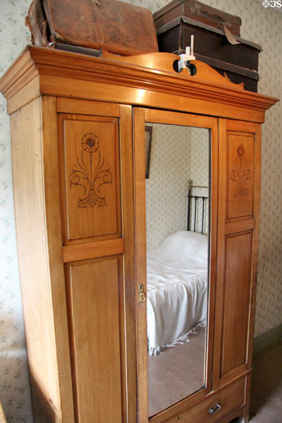 Bedroom cupboard with mirror at Tenement House museum. Glasgow, Scotland.