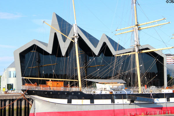 Riverside Museum (2011) beyond Glenlee Tall Ship. Glasgow, Scotland. Architect: Zaha Hadid.