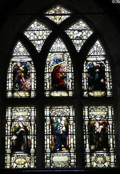 Stained glass window (1906) with Mary ringed by biblical episodes at Culross Abbey Church. Culross, Scotland.
