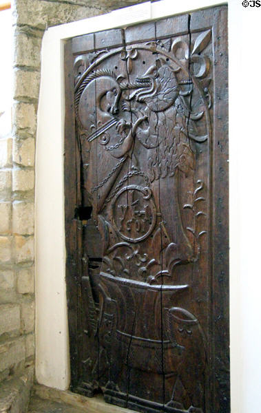 Carved door (1601) with Scottish royal symbols at Traquair House. Scotland.
