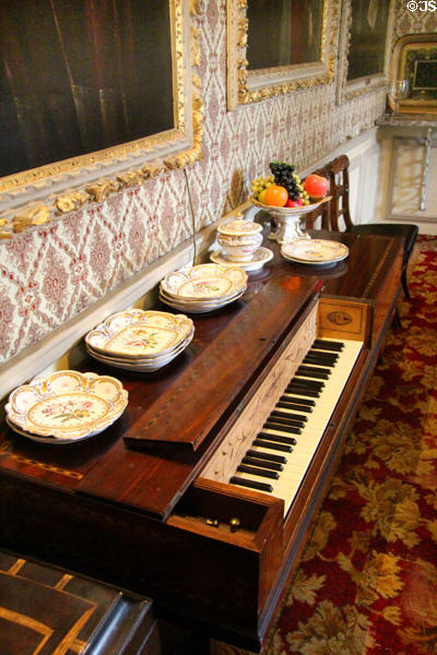 Piano in dining room under wallpaper purchased at Great Exhibition (1851) at Traquair House. Scotland.