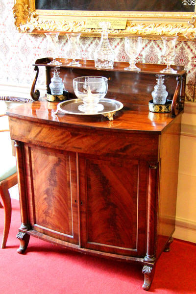 Sideboard with wine decanters in dining room at Traquair House. Scotland.